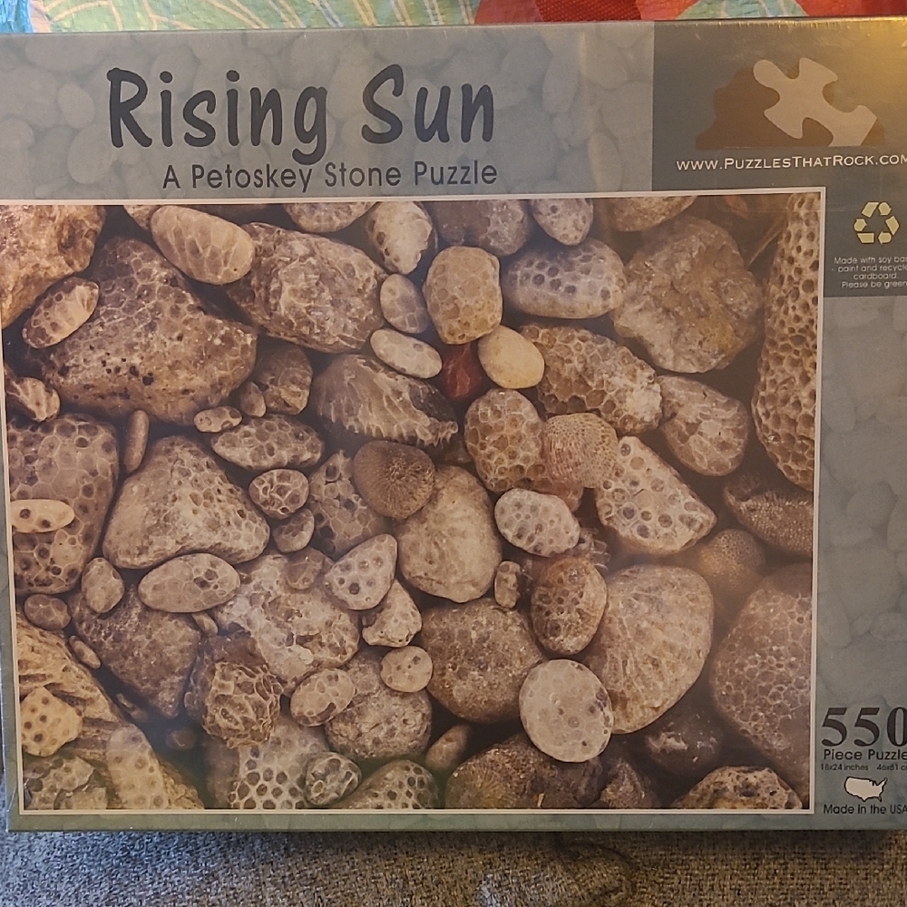 New in box! Rising Sun Petoskey Stone 550 piece jigsaw puzzle